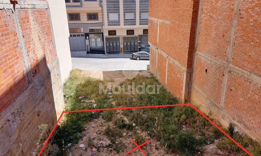 Terrain titré en lotissement à vendre