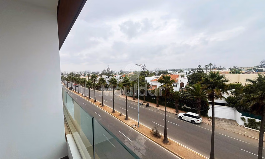 Appartement Chic à Aïn Diab: 2 Chambres, Balcon & Sécurité Appartement Chic à Aïn Diab: 2 Chambres, Balcon & Sécurité