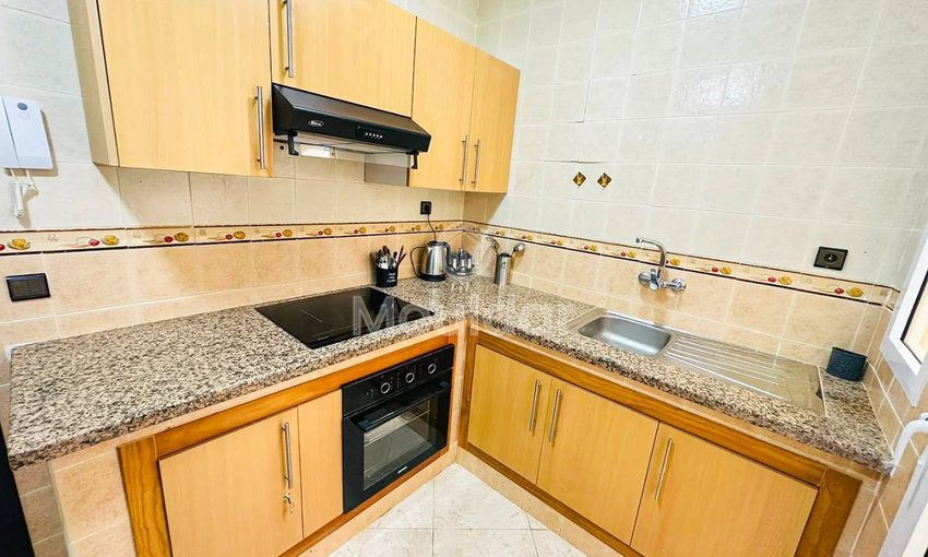 Ontsnap naar Tanger: Appartement met 2 Slaapkamers, Balkon en Beveiliging - view 9