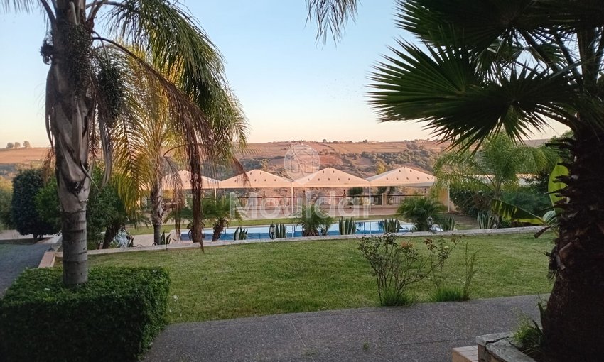 Villa d'Exception à Rabat-Agdal avec Piscine et Jardin Luxueux - view 5