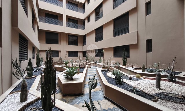 Élégant Appartement 2 Chambres avec Terrasse et Piscine à Guéliz - 6