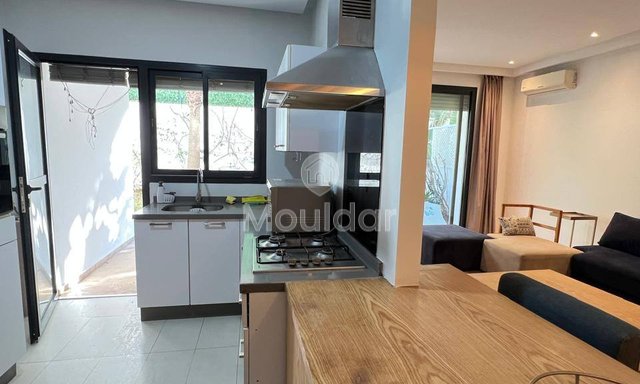 شقة مفروشة للإيجار مع حديقة في دار بوعزة - 2