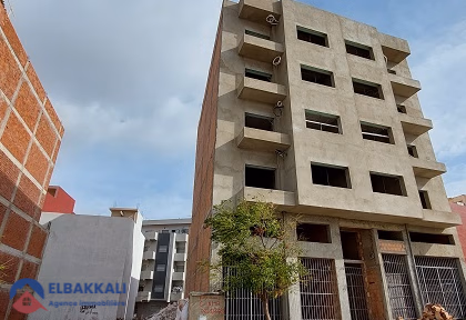 Geteelde bouwgrond in een woonwijk te koop