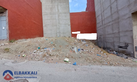 Geteelde bouwgrond in een woonwijk te koop