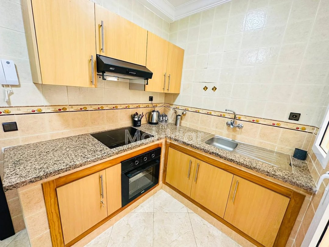 Ontsnap naar Tanger: Appartement met 2 Slaapkamers, Balkon en Beveiliging - Photo 9